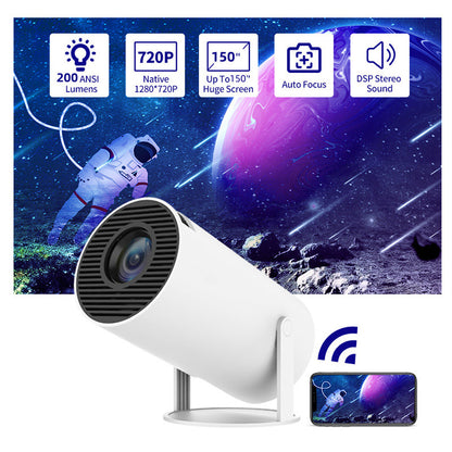 Portable projector displaying galaxy image on screen