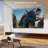 Portable mini home theater projector set up outdoors