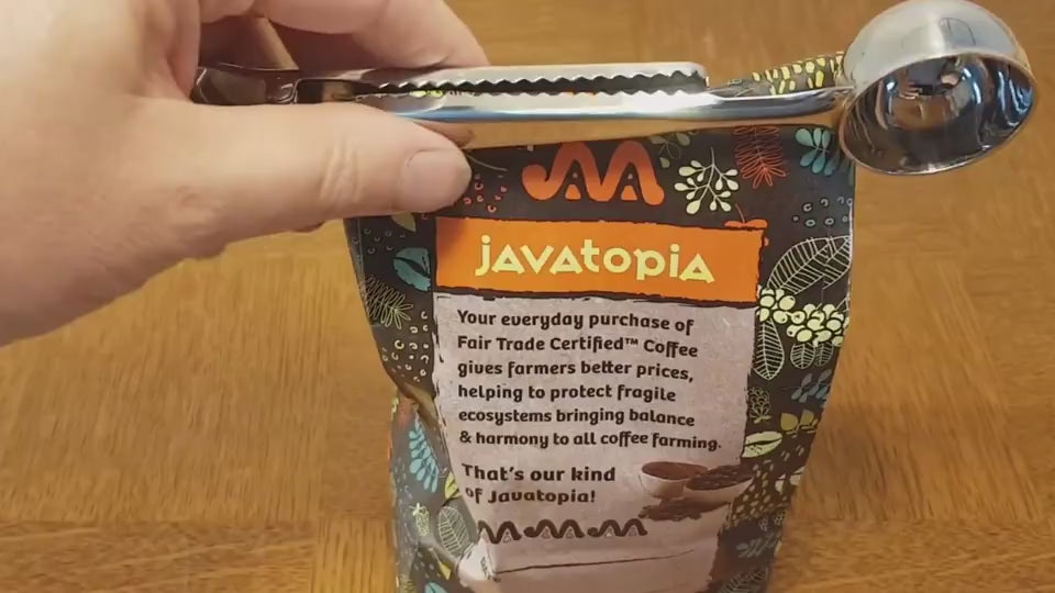 Coffee scoop clip attached to coffee bag with sealer clip

