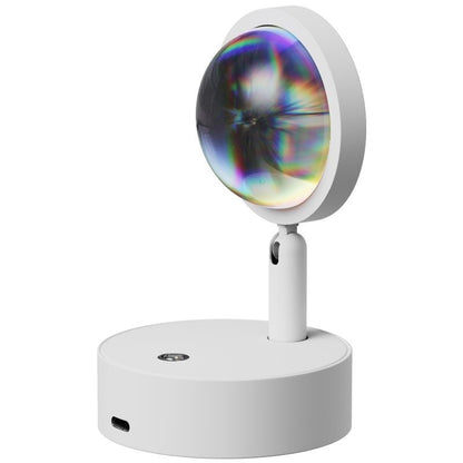 Blue purple rechargeable wall lamp casting cool colored light on a bedroom wall at night
