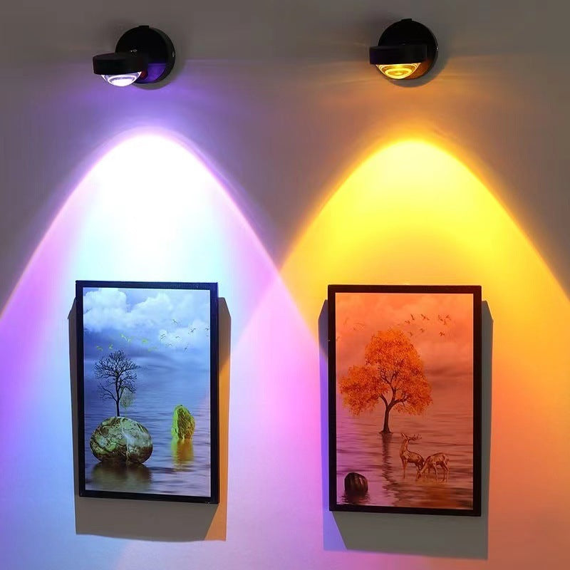 Rechargeable sunset red wall lamp glowing on a bedroom wall with warm orange tones
