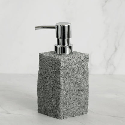 Grey resin soap dispenser from 4 piece bathroom set