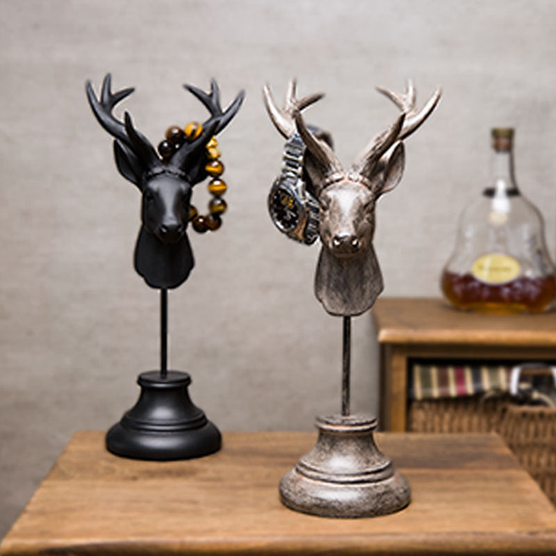 Black resin deer head home decoration statue on wooden table