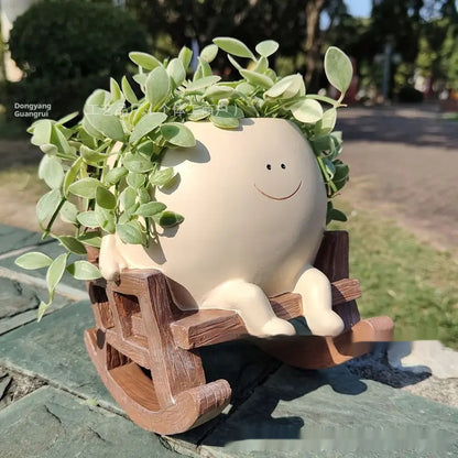 Resin lady rocking chair planter creamy white with succulent
