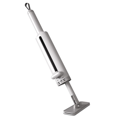 Gray rotatable self squeezing mop standing upright