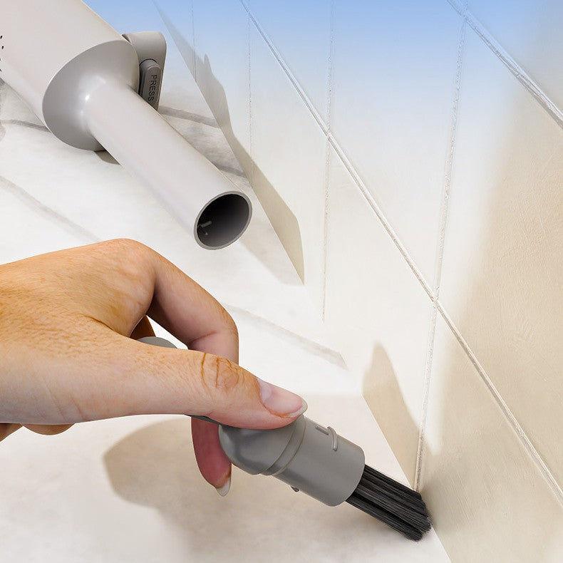 Hand using rotatable self squeezing mop on floor