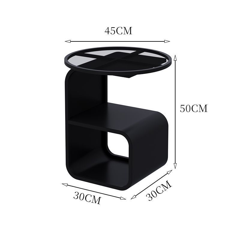 Round tempered glass side table holding multiple items showing 15kg weight capacity in use
