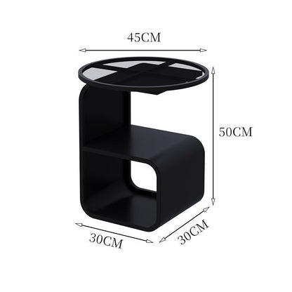 Round tempered glass side table holding multiple items showing 15kg weight capacity in use
