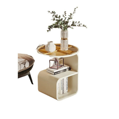Compact round glass side table fitting in a narrow space between a sofa and a wall

