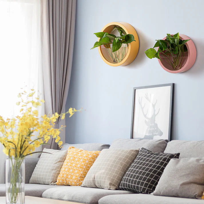 Round wall vase flower art in bedroom decor setting