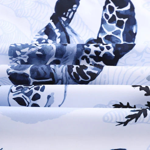 Sea turtle duvet cover blue botanical floral flat lay