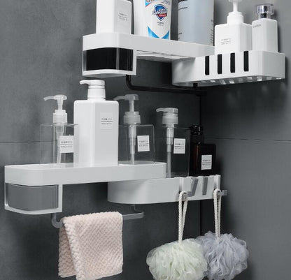 Self adhesive shower shelf mounted in bathroom corner