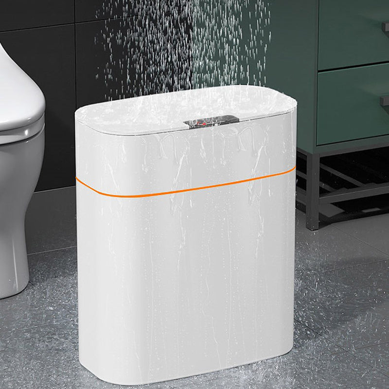 Cream white smart touchless trash can in bathroom