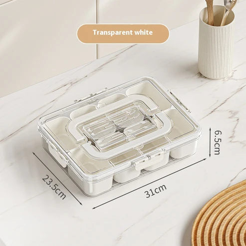 Divided snack box organizer with open lid showing 8 compartments filled with food