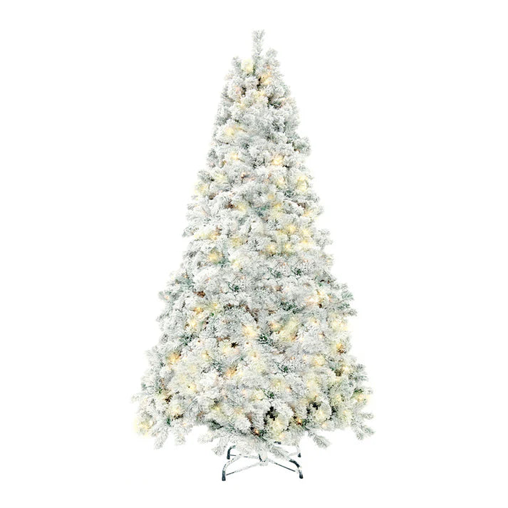 Snowy Christmas tree in mall window display
