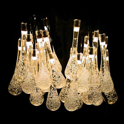 Solar crystal water drop fairy lights warm white close up outdoor