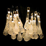 Solar crystal water drop fairy lights warm white close up outdoor