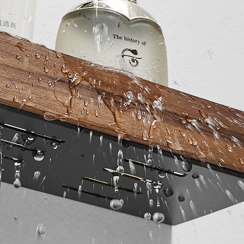 Dark solid wood floating wall shelf mounted on wall
