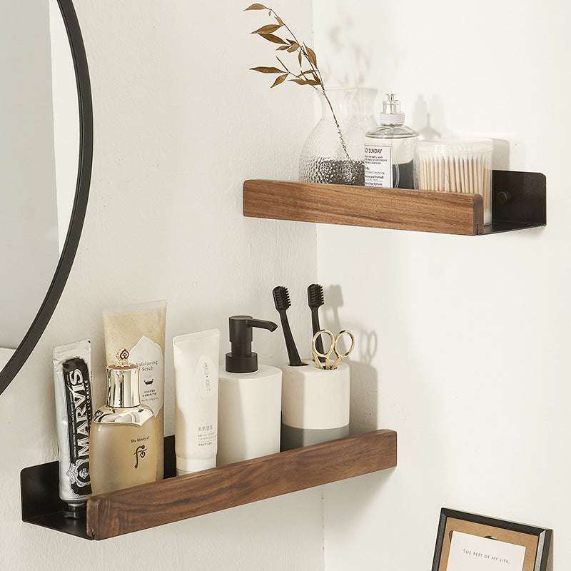 Solid wood floating wall shelf styled in bathroom setting