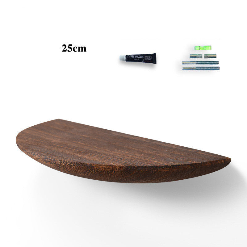 Close-up of the no drill adhesive mount on the back of the solid wood shelf