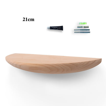 Dark reburning finish solid wood floating shelf on a living room wall