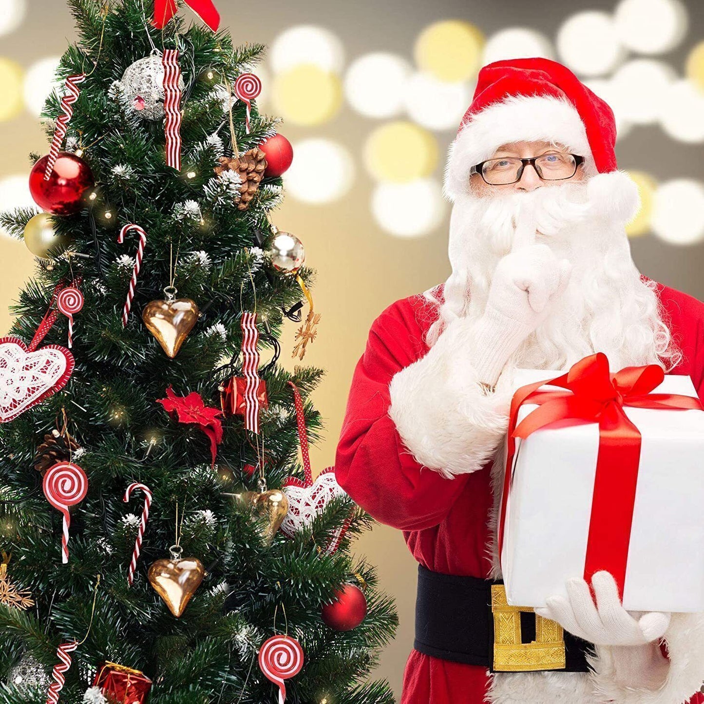 Splendas Christmas candy cane tree decoration displayed with Santa Claus figure