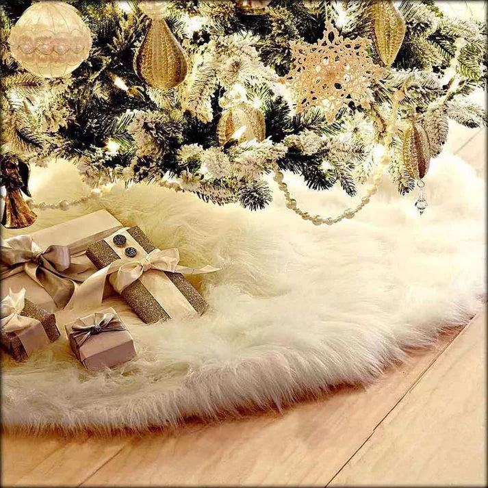Splendas white plush faux fur Christmas tree skirt styled around decorated tree base
