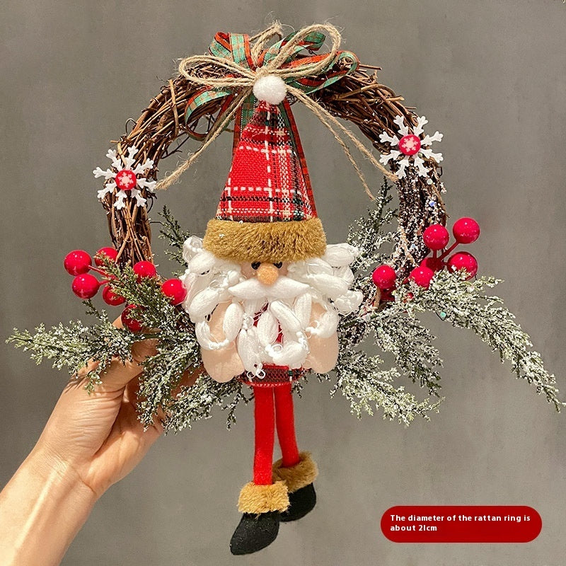 Splendas Christmas vine ring wreath with Santa Claus bow decoration held up close display