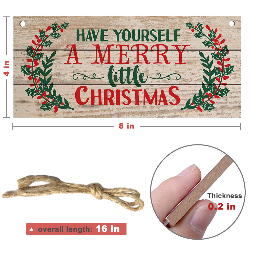 Close up detail of Splendas carved beech wood Christmas wall hanging sign festive text