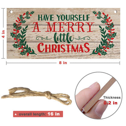 Close up detail of Splendas carved beech wood Christmas wall hanging sign festive text