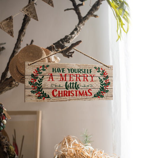 Splendas Christmas wooden wall hanging sign displayed on wall with natural rope hanger