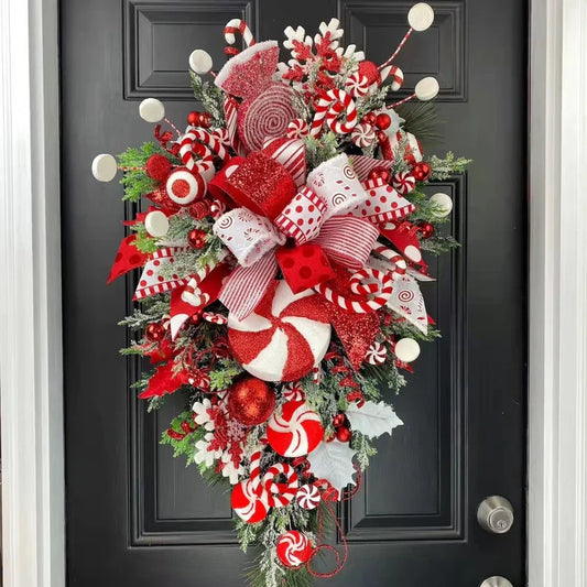 Splendas handmade Christmas wreath door pendant with candy cane decoration on front door