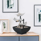 Splendas indoor flowing water fountain ornament styled in modern home office lifestyle setting