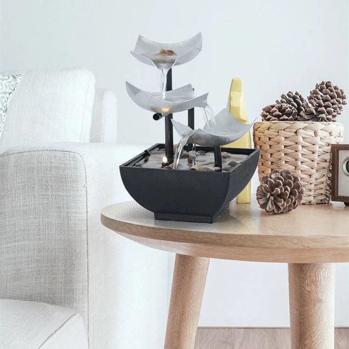 Splendas indoor flowing water fountain ornament with pebbles in black base display