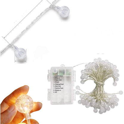 Splendas LED crystal ball string lights shown with remote control for brightness settings
