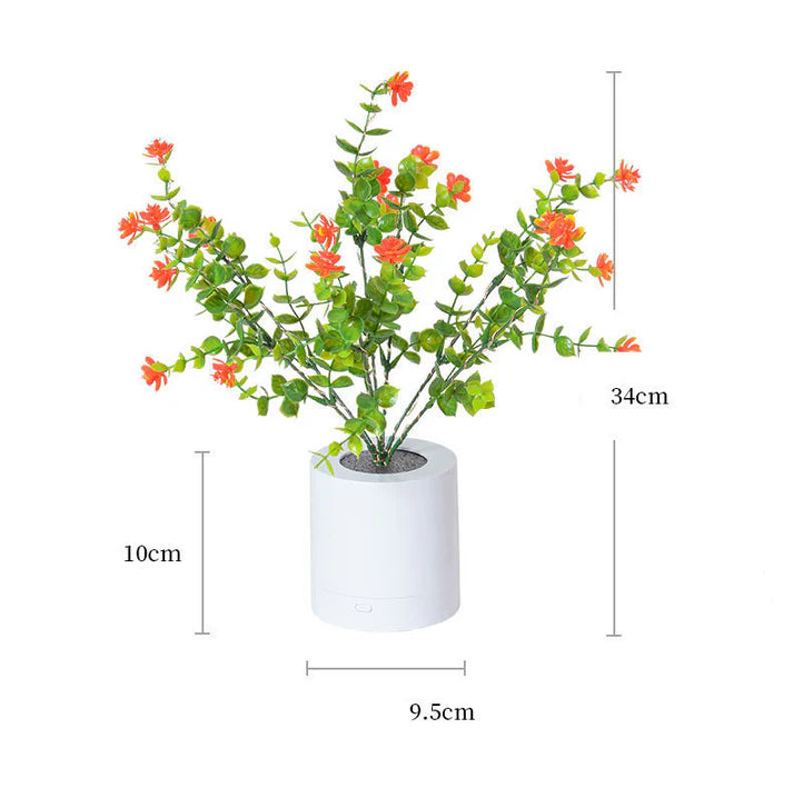 Close up detail of Splendas LED rechargeable flower night light glowing in adjustable brightness