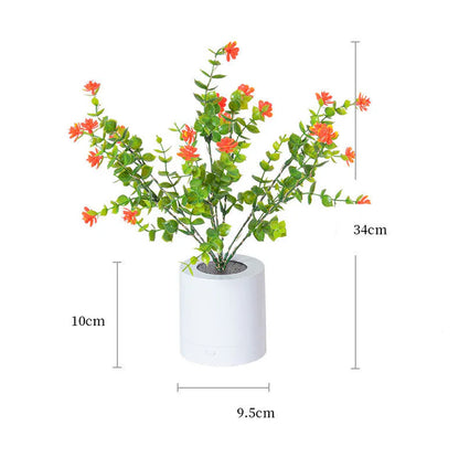 Close up detail of Splendas LED rechargeable flower night light glowing in adjustable brightness