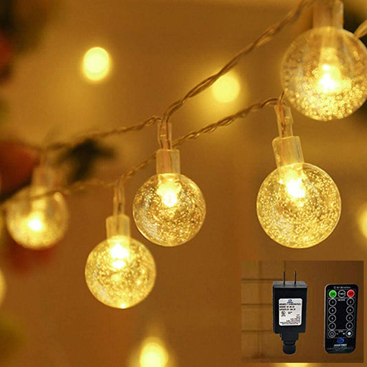 Splendas LED warm white crystal bubble ball string lights glowing in room setting