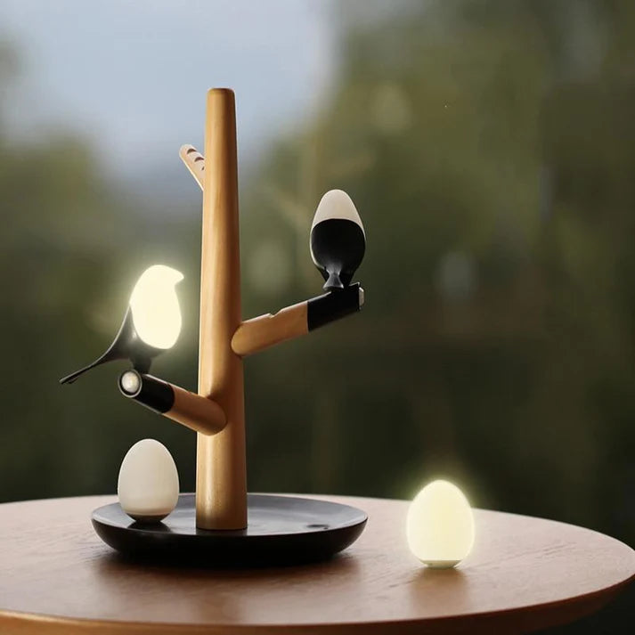 Splendas LED wooden bird atmosphere light in dark sapele version display on table