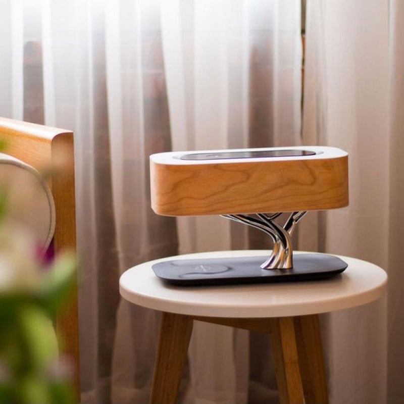 Splendas creative tree light table lamp showing white light mode on bedside table