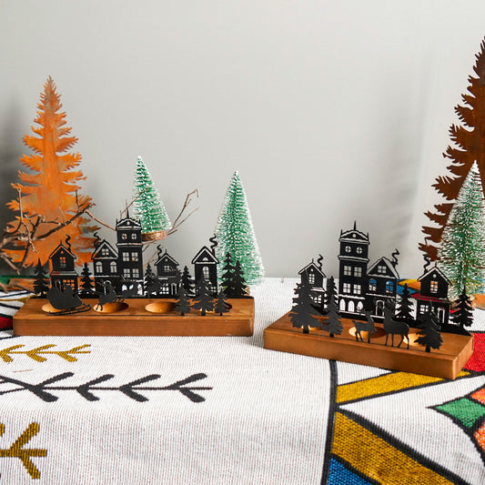 Close up detail of Splendas wrought iron Christmas candle holder with pine trees