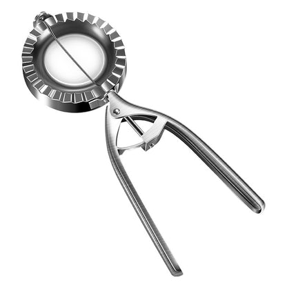 Silver stainless steel dumpling maker press on white background