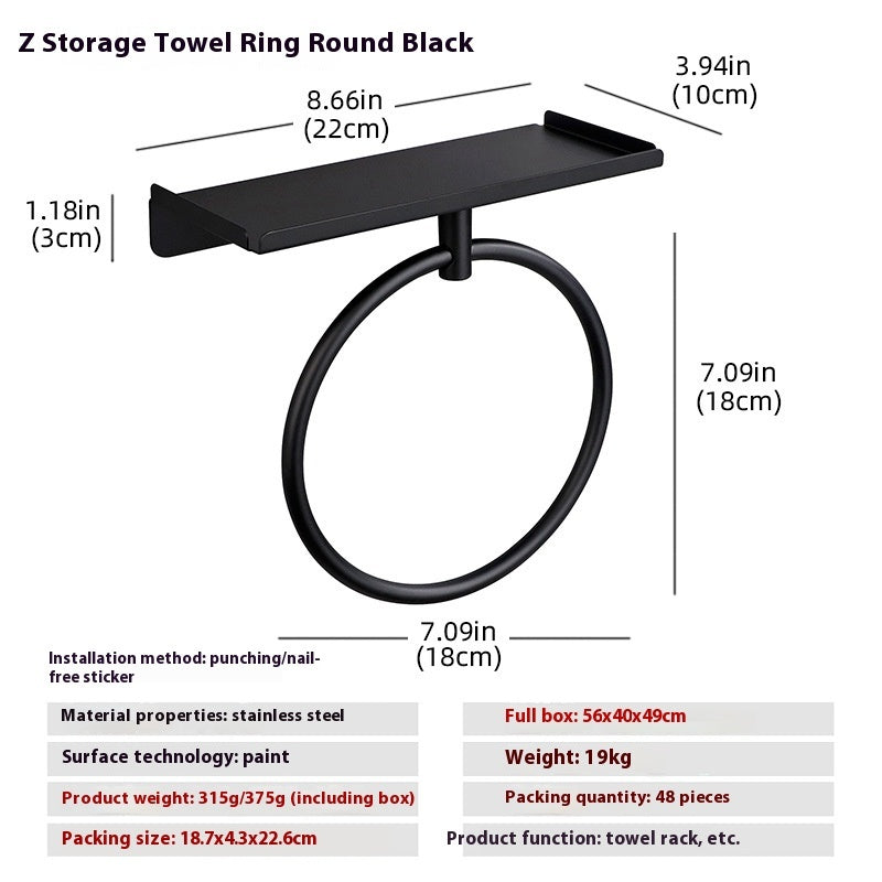Full size bath towel folded over a stainless steel wall mounted oval towel ring
