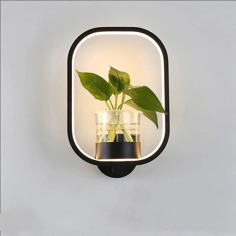 Indoor stairs lighting setup featuring a white LED plant lamp on the wall