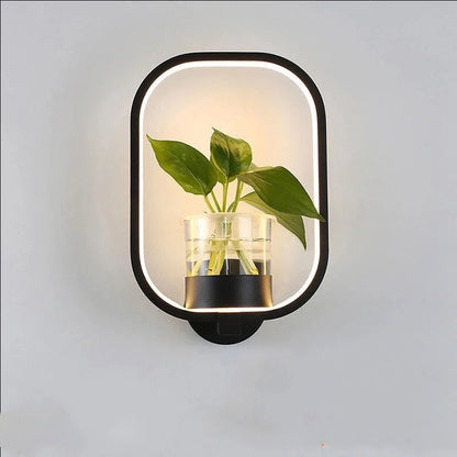 Indoor stairs lighting setup featuring a white LED plant lamp on the wall