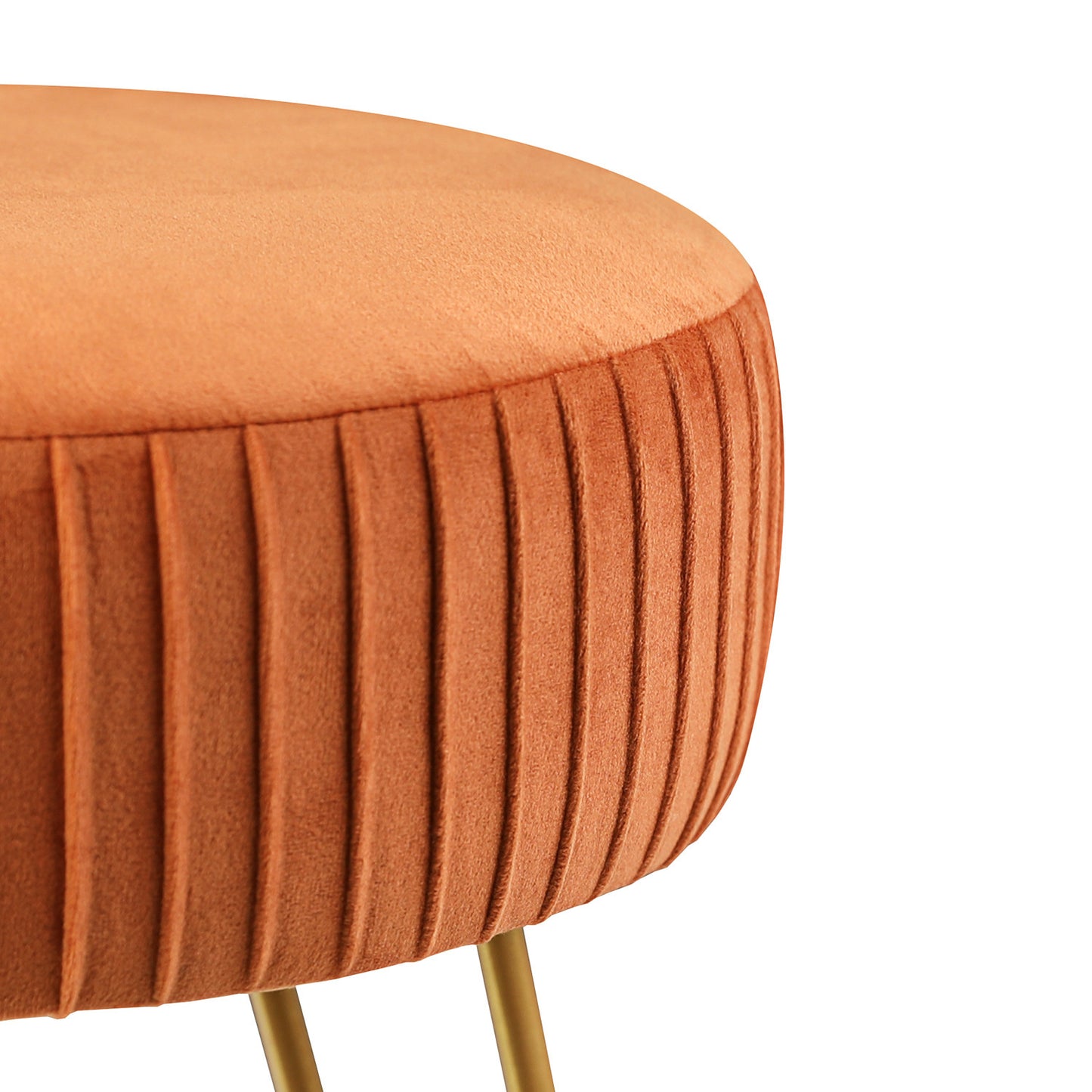 Striped metal footstool folded flat for storage beside a bedroom wall
