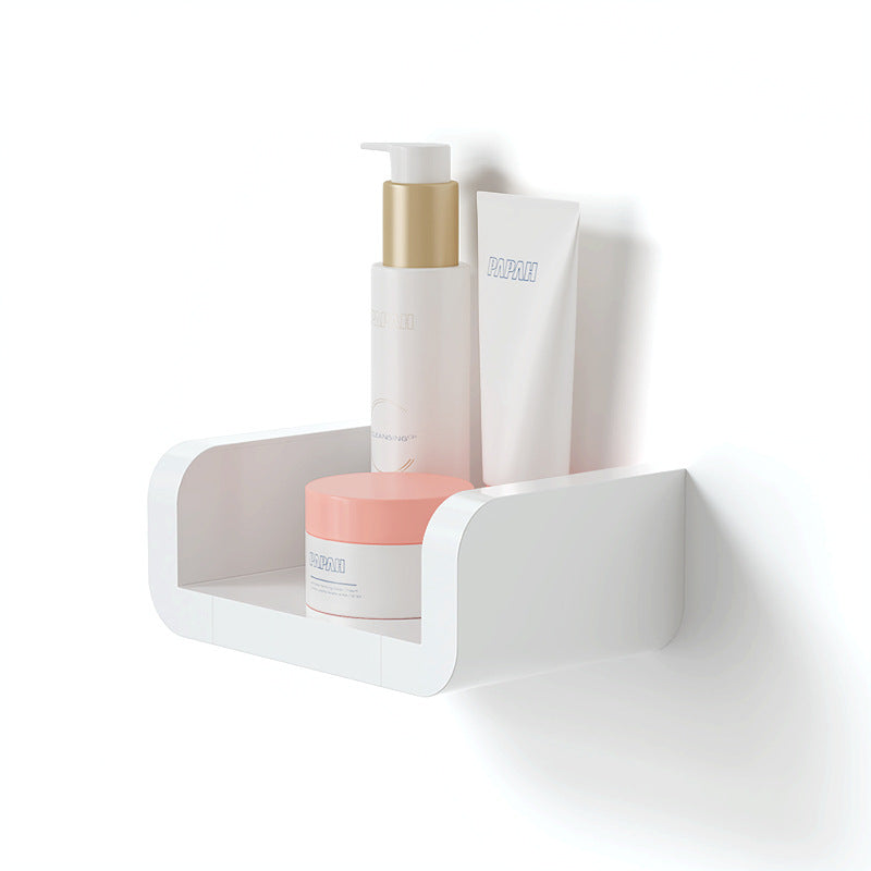 Suction cup bathroom shelf holding toiletries