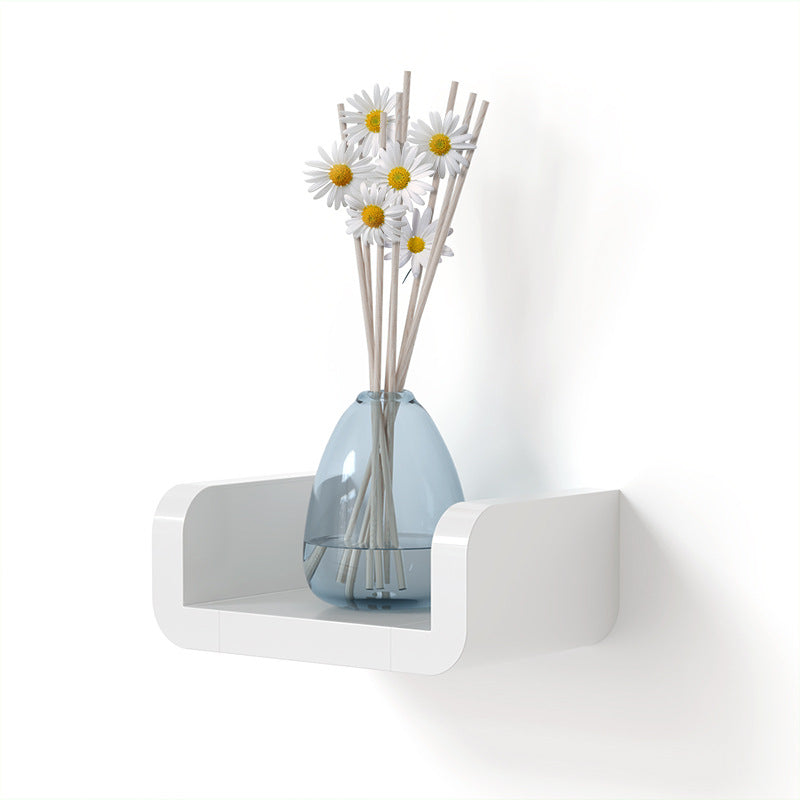 Suction cup bathroom shelf styled with small plant