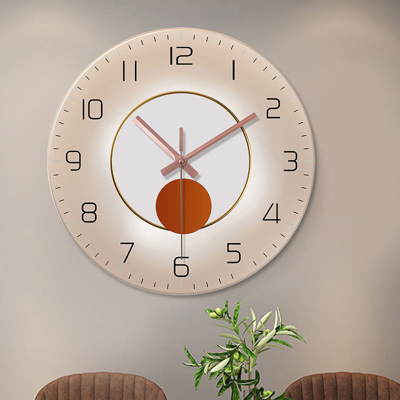Decorative glass wall clock mounted in modern living room