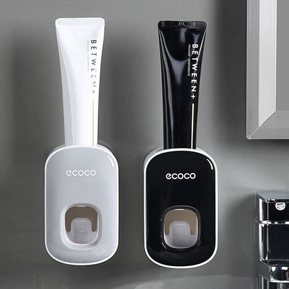 Toothpaste dispenser holder with triple cup set
